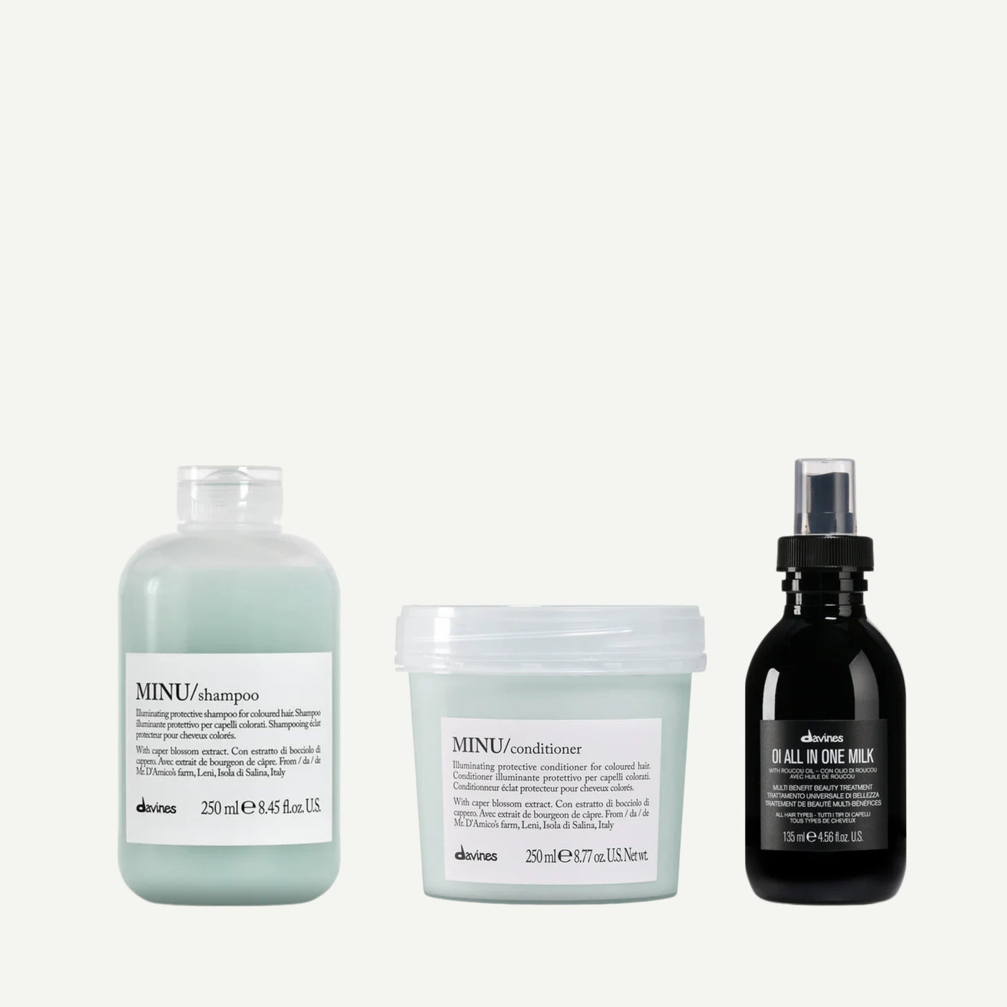 Davines Magical Rainforest Kit featuring MINU Shampoo, MINU Conditioner, and OI All In One Milk. A trio for color-treated hair to enhance shine, hydration, and protection.