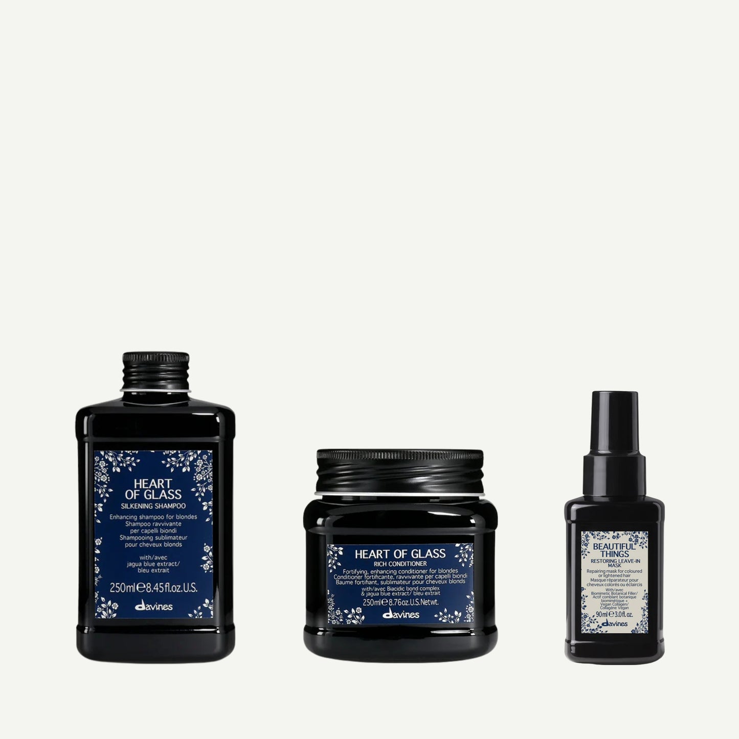 Davines Mysterious Polar Regions Kit featuring Heart of Glass Silkening Shampoo, Heart of Glass Rich Conditioner, and Beautiful Things Leave-In Mask — a trio designed to brighten, strengthen, and protect blonde or lightened hair.