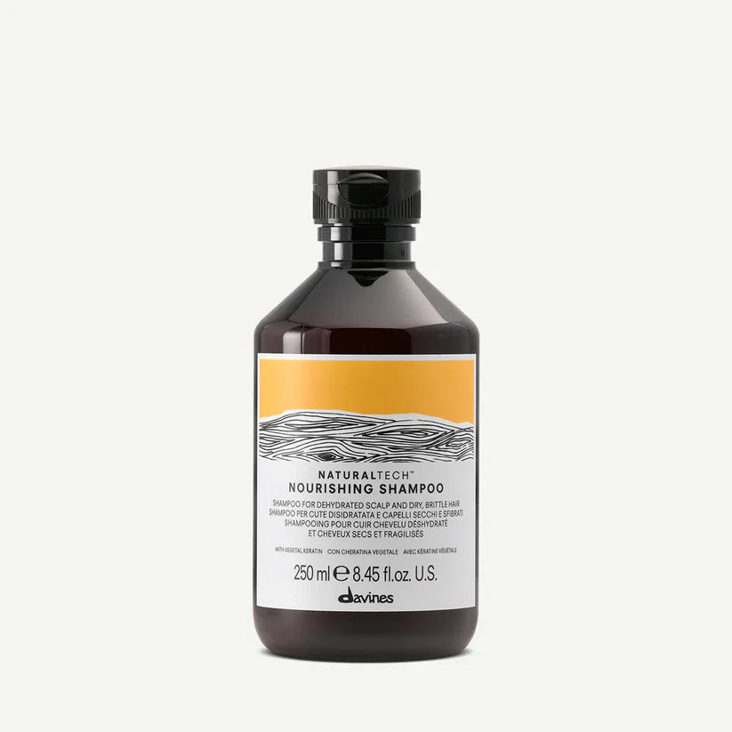 Davines Naturaltech Nourishing Shampoo — restorative shampoo for dry, brittle hair and dehydrated scalp, formulated with vegetal keratin and natural actives to gently cleanse, hydrate, and strengthen.
