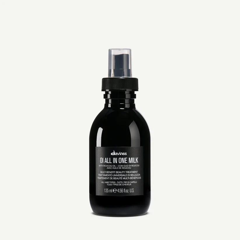 Davines OI All In One Milk 135ml — multi-benefit leave-in spray enriched with Roucou oil, designed to hydrate, detangle, and protect all hair types with radiant softness.