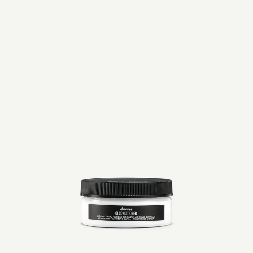 Davines OI Conditioner 75ml — travel-size beautifying conditioner infused with Roucou oil that deeply nourishes, detangles, and adds softness and shine for all hair types.