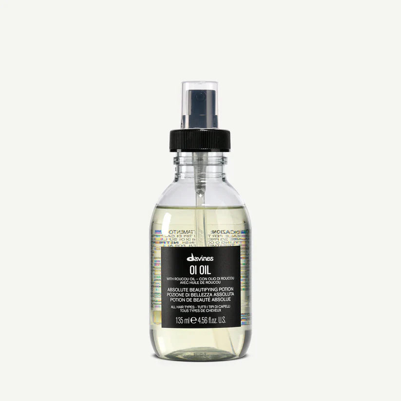 Davines OI Oil 135ml — lightweight beautifying hair oil infused with Roucou oil, providing deep nourishment, frizz control, and luminous shine for all hair types.