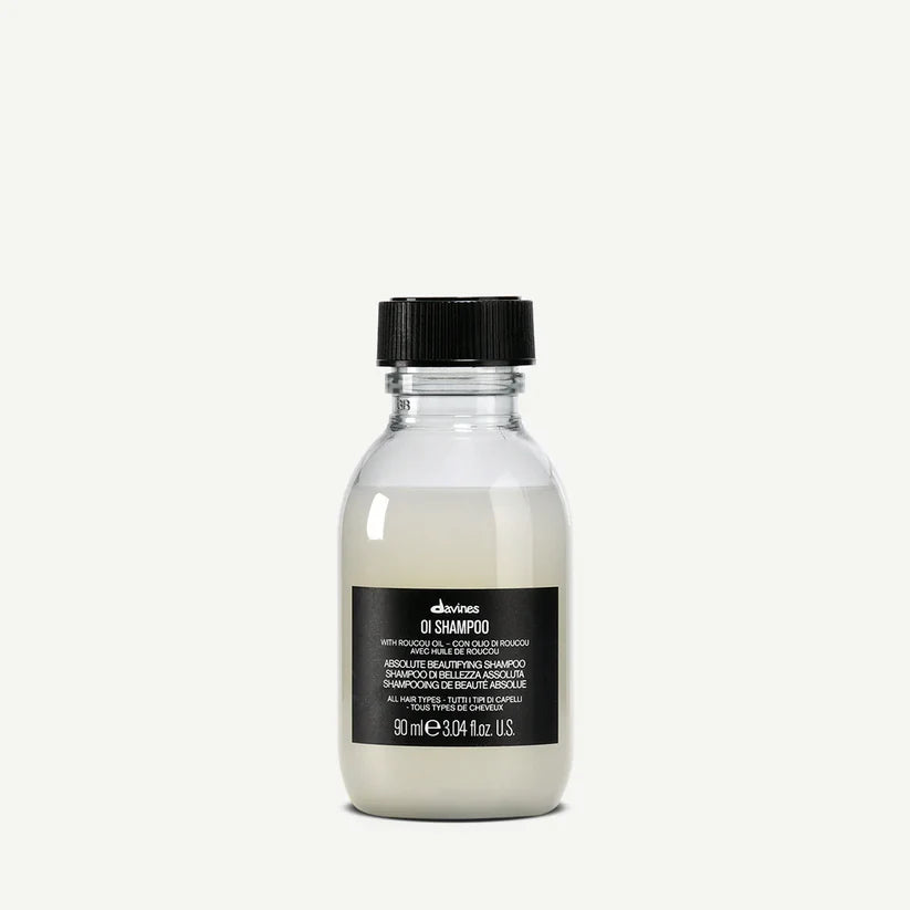 Davines OI Shampoo 90ml — travel-size beautifying shampoo enriched with Roucou oil that gently cleanses, nourishes, and adds shine and softness for all hair types.