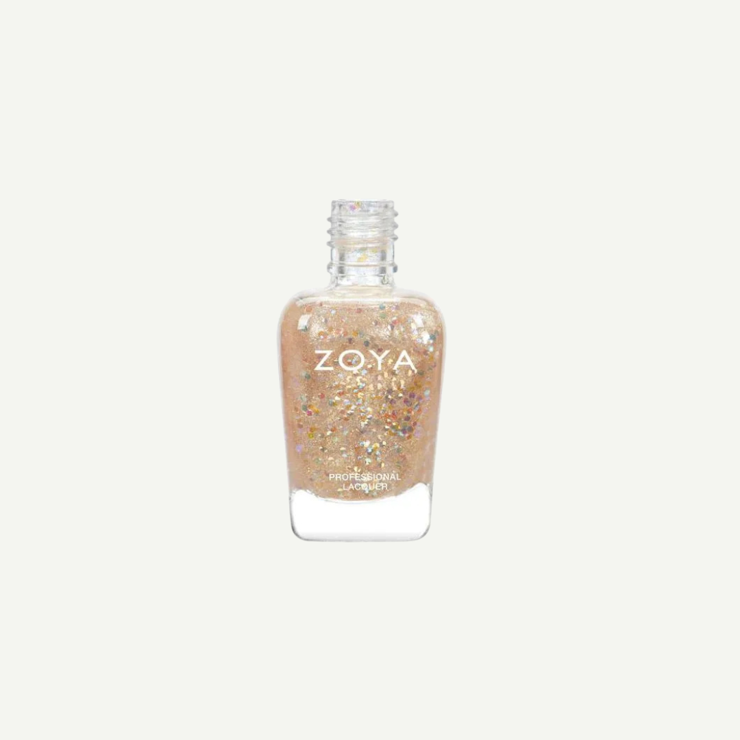 Zoya nail polish bottle with glittery gold color on a white background