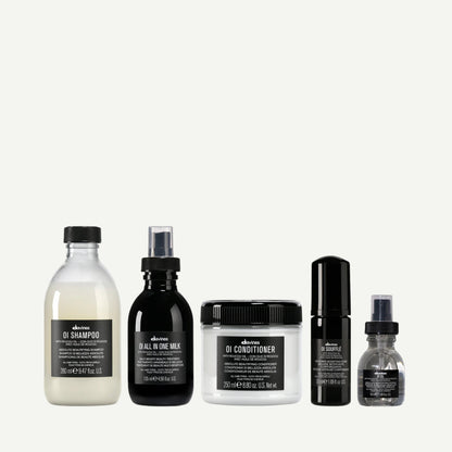Davines Deep Marine World Kit featuring OI Shampoo, OI Conditioner, OI All In One Milk, OI Soufflé, and OI Oil — a luxurious 5-piece haircare set that nourishes, softens, and adds radiant shine for all hair types.