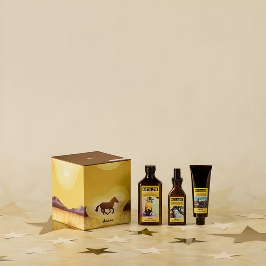 Set of skincare products with a decorative box on a beige background
