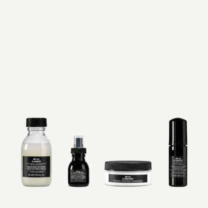 Davines Elegant Tropic Forest Kit, Davines travel set, OI travel kit, Roucou oil hair care, travel-size hair products, hydrating hair kit, shine and softness, luxury hair travel set, Davines OI collection, mini hair care set.