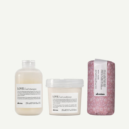 Davines Wild Desert Kit featuring LOVE Curl Shampoo, LOVE Curl Conditioner, and This is a Curl Building Serum — a trio designed to hydrate, define, and enhance natural curls with softness and shine.
