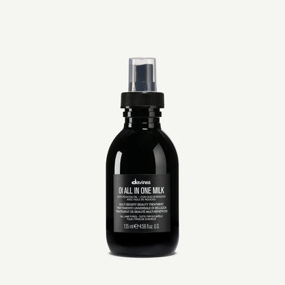 Davines OI All In One Milk 135ml — multi-benefit leave-in spray enriched with Roucou oil, designed to hydrate, detangle, and protect all hair types with radiant softness.
