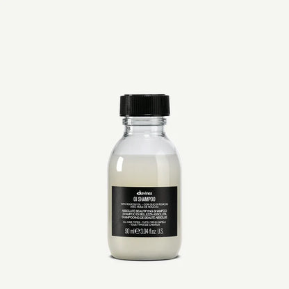 Davines OI Shampoo 90ml — travel-size beautifying shampoo enriched with Roucou oil that gently cleanses, nourishes, and adds shine and softness for all hair types.