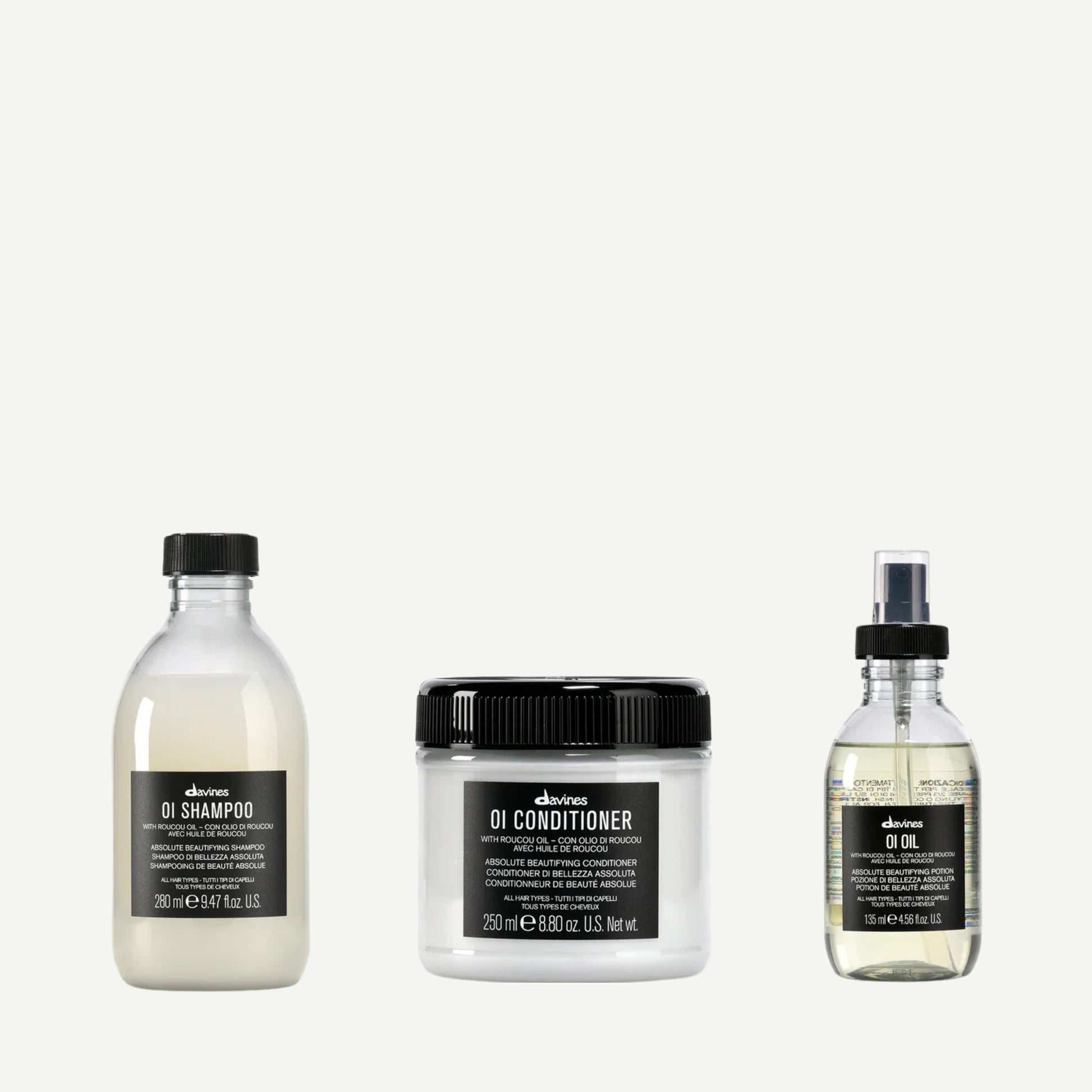 Davines Precious Temperate Forest Kit featuring OI Shampoo, OI Conditioner, and OI Oil — a nourishing holiday gift set infused with Roucou oil for radiant, silky, and beautifully scented hair.